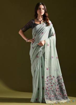 Firozi color muga cotton flower weaving concept saree 1