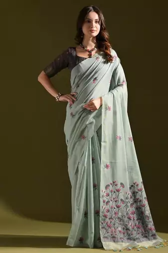 Firozi color muga cotton flower weaving concept saree