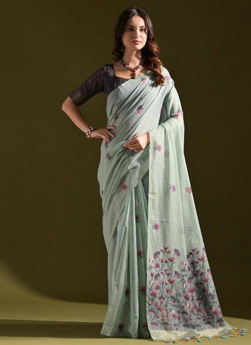 Firozi color muga cotton flower weaving concept saree