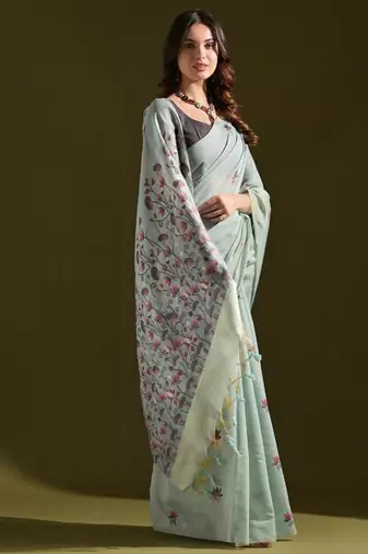 Firozi color muga cotton flower weaving concept saree