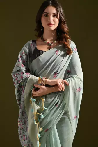 Firozi color muga cotton flower weaving concept saree
