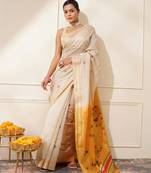 Off-white & yellow color muga cotton resham weaving saree