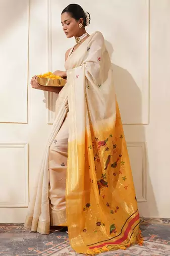 Off-white & yellow color muga cotton resham weaving saree
