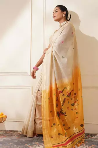 Off-white & yellow color muga cotton resham weaving saree