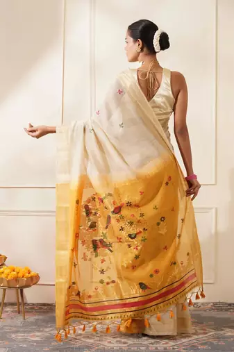 Off-white & yellow color muga cotton resham weaving saree