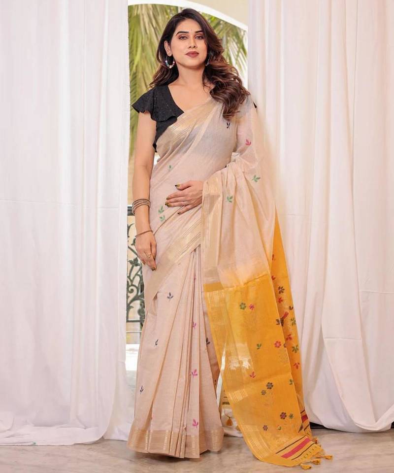 Off-white & yellow color muga cotton resham weaving saree