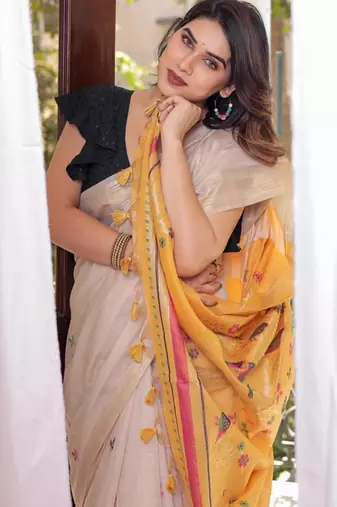 Off-white & yellow color muga cotton resham weaving saree