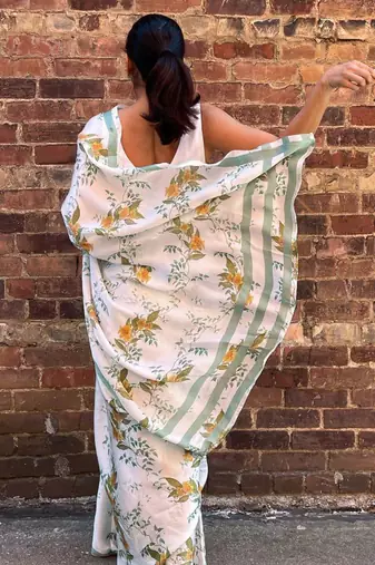 White original japan satin saree with digital print blouse