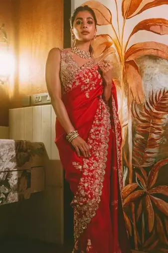 Red heavy embroidered rangoli silk blend saree