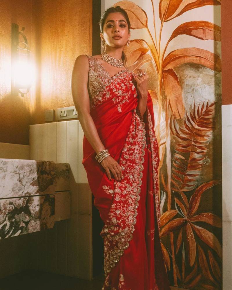 Red heavy embroidered rangoli silk blend saree