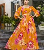 Women mustard all-over floral print georgette fit & flare gown