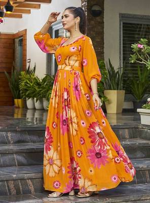 Women mustard all-over floral print georgette fit & flare gown 3