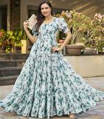 Women turquoise blue all-over floral print georgette fit & flare gown