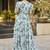 Women turquoise blue all-over floral print georgette fit & flare gown