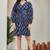 Women navy blue all-over floral print poly cotton fit & flare gown