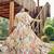 Women off white tropical leaf printed flared maxi dress