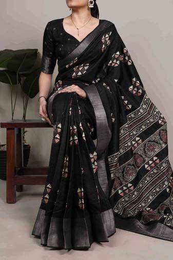 Black rich slub silk printes with zari border saree