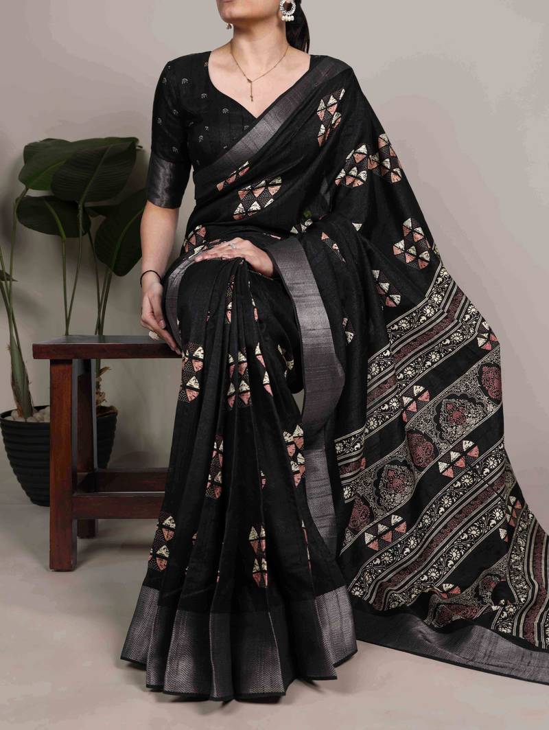 Black rich slub silk printes with zari border saree