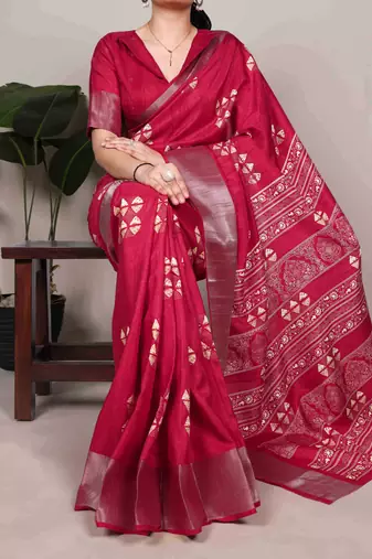 Cherry red rich slub silk printes with zari border saree
