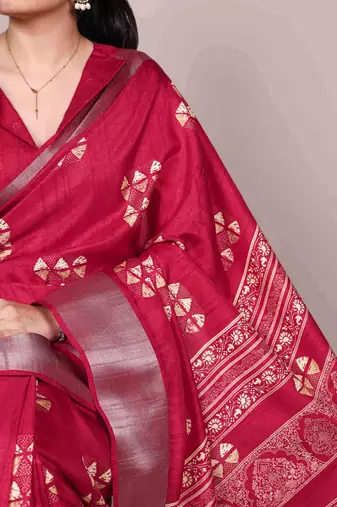 Cherry red rich slub silk printes with zari border saree