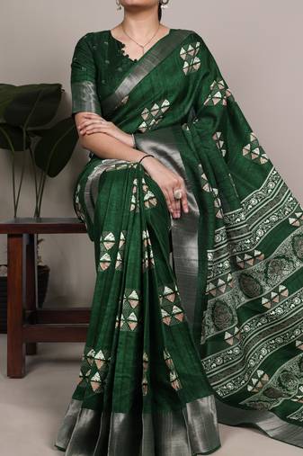 Green rich slub silk printes with zari border saree