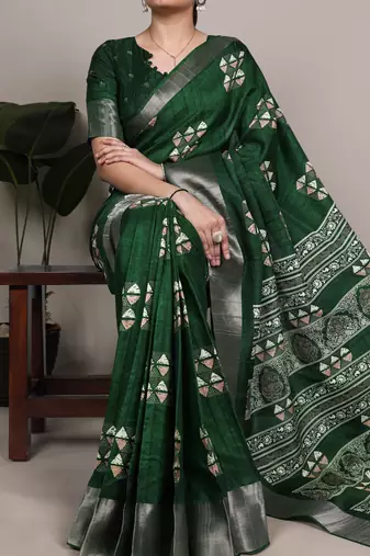 Green rich slub silk printes with zari border saree