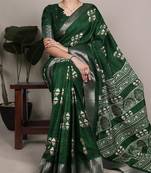 Green rich slub silk printes with zari border saree