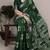 Green rich slub silk printes with zari border saree