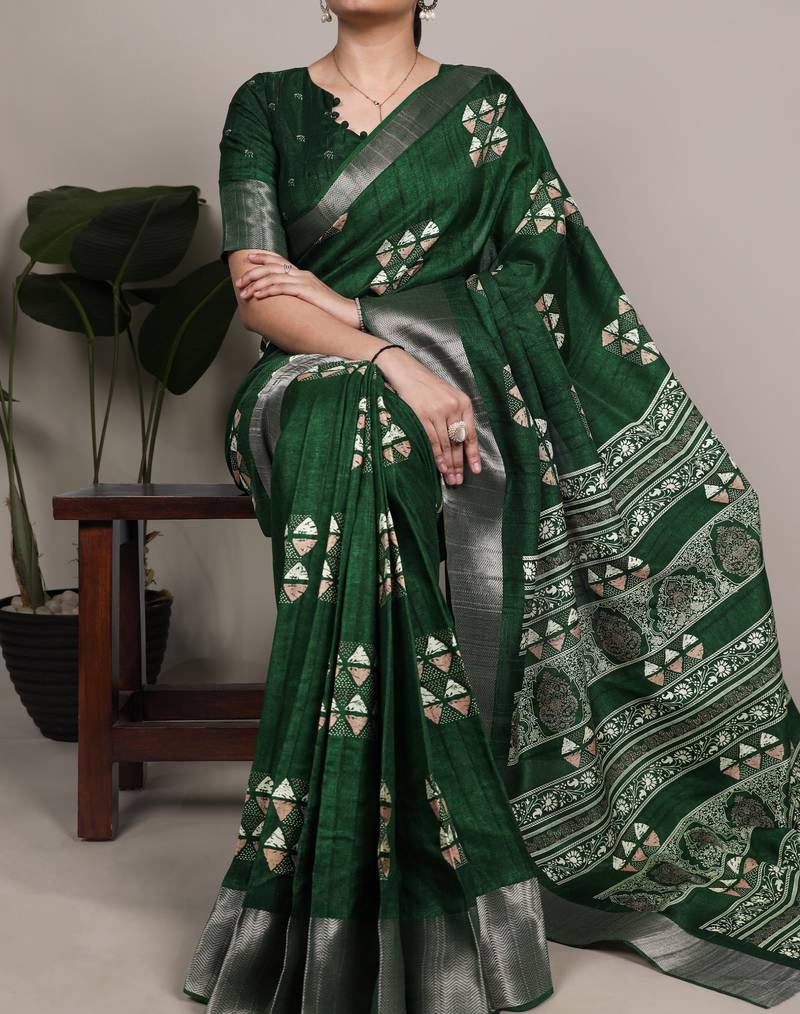 Green rich slub silk printes with zari border saree