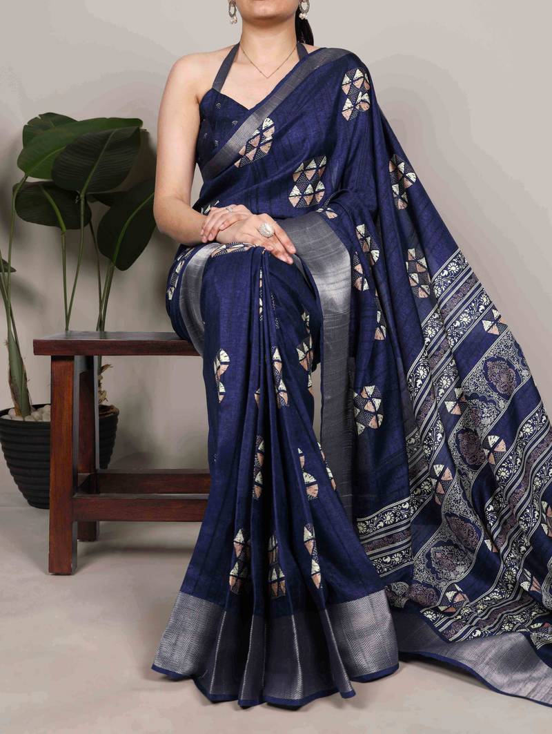 Navy blue rich slub silk printes with zari border saree