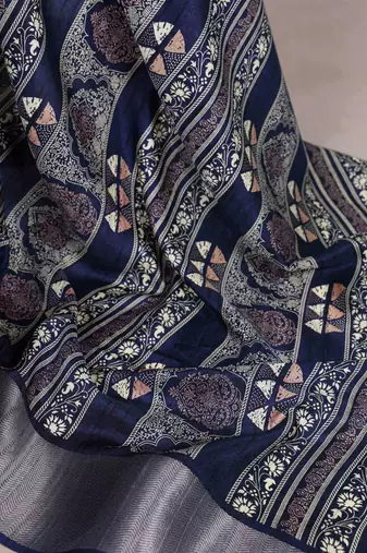 Navy blue rich slub silk printes with zari border saree