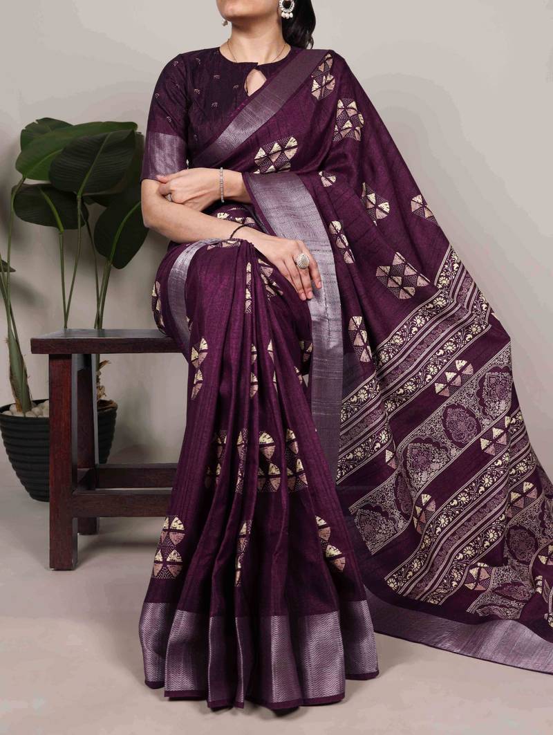 Wine rich slub silk printes with zari border saree
