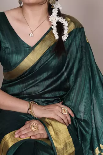 Green onam special raw silk zari weaving work saree