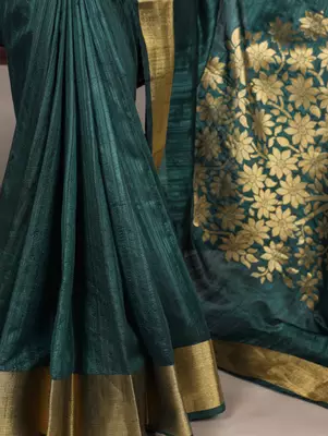 Green onam special raw silk zari weaving work saree 4