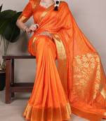 Orange onam special raw silk zari weaving work saree