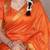 Orange onam special raw silk zari weaving work saree