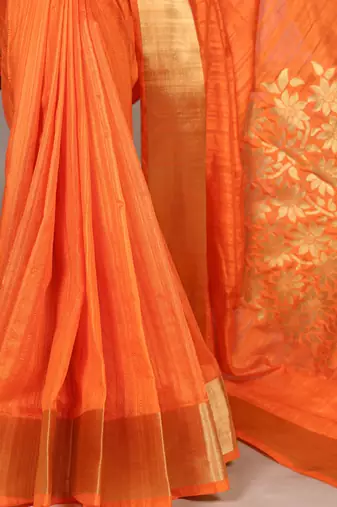 Orange onam special raw silk zari weaving work saree