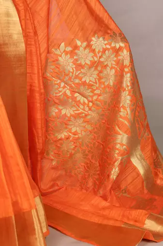 Orange onam special raw silk zari weaving work saree