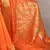Orange onam special raw silk zari weaving work saree