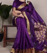 Purple onam special raw silk zari weaving work saree
