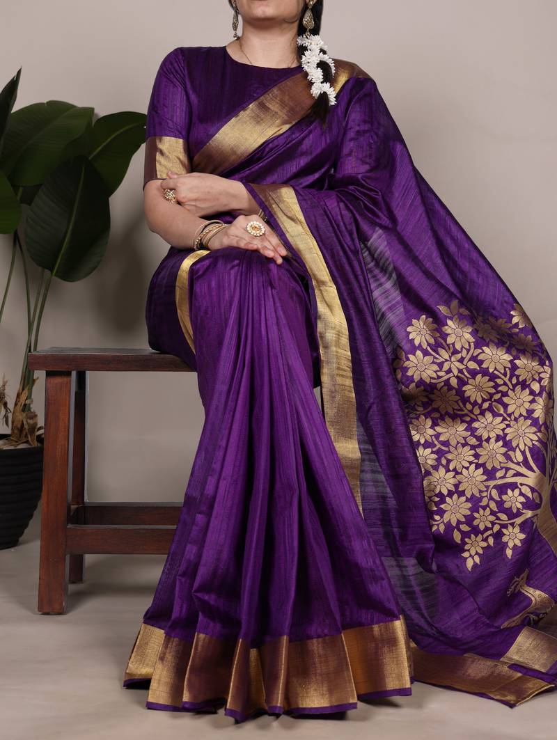 Purple onam special raw silk zari weaving work saree