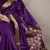 Purple onam special raw silk zari weaving work saree