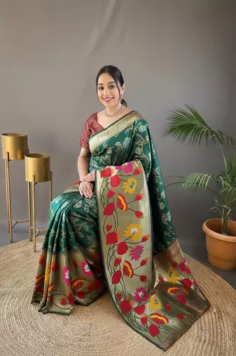 Dark green art silk  woven saree
