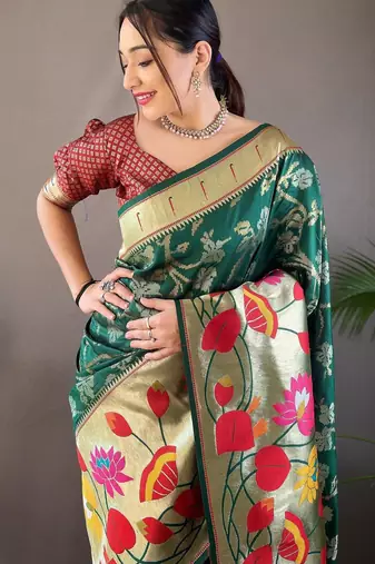 Dark green art silk  woven saree