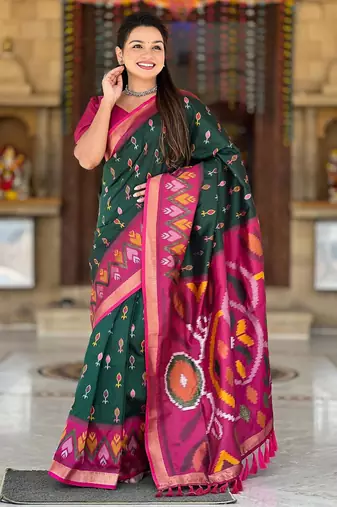 Dark green art silk  woven saree
