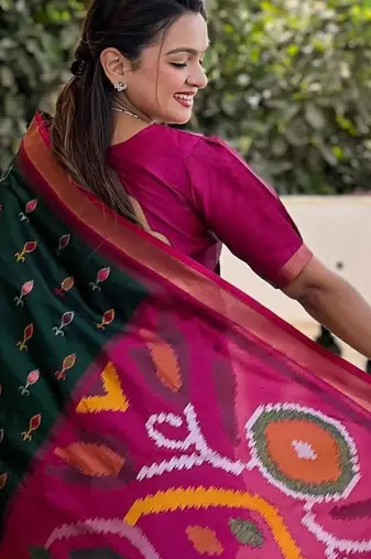 Dark green art silk  woven saree
