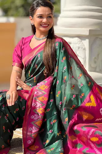 Dark green art silk  woven saree