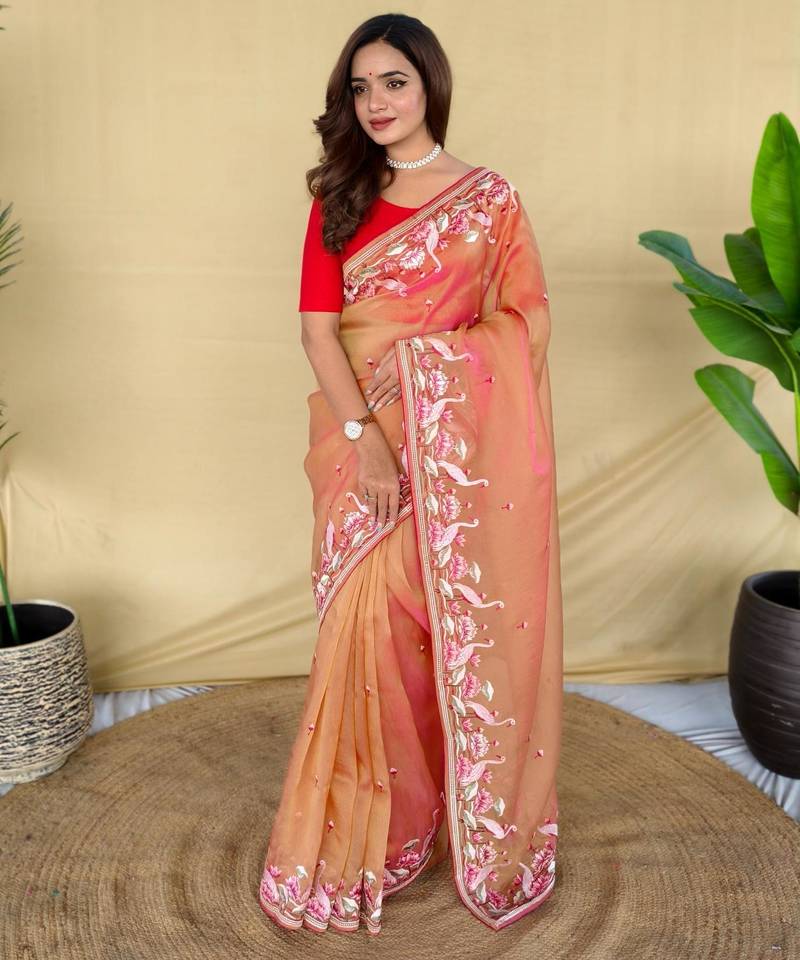 Peach art silk  woven saree