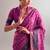 Checkered polyester viscose chanderi saree featuring vibrant printed motifs & traditional zari border