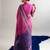 Checkered polyester viscose chanderi saree featuring vibrant printed motifs & traditional zari border